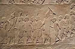 Nubian prisoners escorted by Assyrian guards out of the Egyptian city.[28]