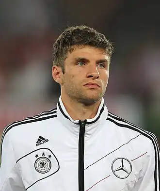 Image 22 Thomas Müller Photograph: Michael Kranewitter Thomas Müller (b. 1989) is a German professional footballer who has played for Bayern Munich since 2009; he is also the team's vice-captain. A versatile player, Müller plays as a midfielder or forward but has also been deployed in attacking roles such as attacking midfielder, second striker, centre forward and on either wing. He has represented Germany on its national team since 2010.