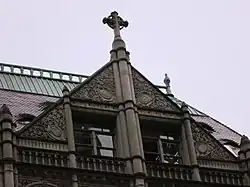 A gable with a window at the top of the building's facade