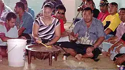Image 23A typical informal faikava in Tonga with the touʻa serving the men. (from List of national drinks)