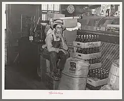 Farm boy in the general store (1938)