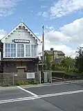Finningley Signal Box between Lincoln and Doncaster. Note remains of closed station in background.