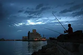 Fisherman on the Doha Corniche next to the Islamic Museum
