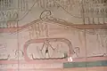 Partial image of the 5th hour of the Amduat depicting Osiris within the cavern and Horus on the royal barge (Tomb of Thutmose III, Valley of the Kings)