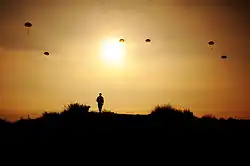 Training jump of paratroopers shortly before sunset in May 2010