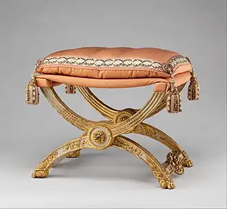 Folding stool (pliant); 1786; carved and painted beechwood, covered in pink silk; 46.4 × 68.6 × 51.4&nbsp;cm; Metropolitan Museum of Art