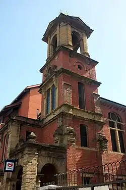 A large stone church building with gothic-style architecture