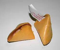 An opened fortune cookie