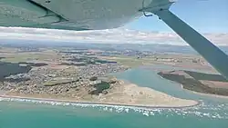 Foxton beach and Manawatū River seen form an Cessna 152