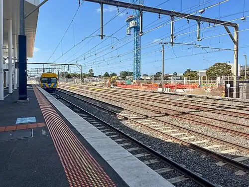 Northbound view from Platform 2 with a Comeng stationary up further at Frankston