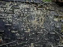 19th-century manhole cover, by Fred Verity, on farmland near Harrogate