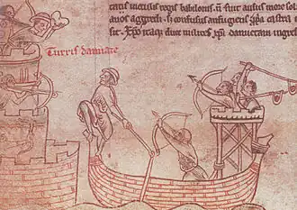 Hayo van Wolvega attacks the tower of Damietta with a flail during the 5th crusade.