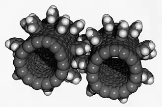 Image 29Computer simulation of nanogears made of fullerene molecules. It is hoped that advances in nanoscience will lead to machines working on the molecular scale. (from Condensed matter physics)