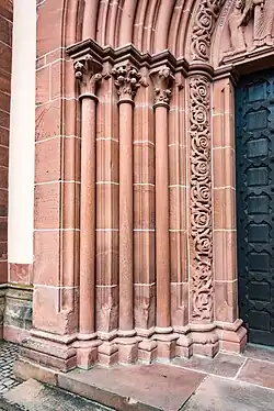 Slender Gothic columns at a portal of Marienkirche Gelnhausen&nbsp;[de] (Gelnhausen, Germany)