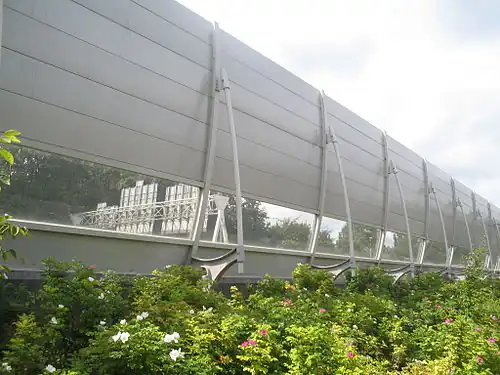 This noise abatement wall in the Netherlands has a transparent section at the driver's eye-level to reduce the visual impact for road users.