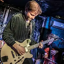 Geordie Greep performing solo material with his band at The Windmill, Brixton in March 2024