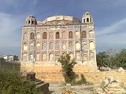 Side view of the tomb before restoration
