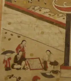 "Giảng học đồ" (Teaching), 18th century, Hanoi museum of National History. Scholars and students wear áo giao lĩnh (cross-collar robe) - unlike the buttoned áo dài.