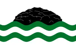 Flag of Girvan, adopted in 2025, featuring a depiction of the island