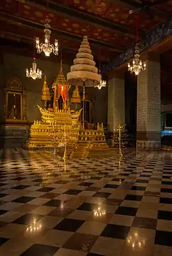 Thailand's Royal Nine-Tiered Umbrella attached to a throne inside a hall in the Grand Palace, Bangkok