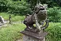 Artist unknown, Statue of guardian lion, located at the gravestones of Ong Sam Leong (d. 1918) and family members, Bukit Brown Cemetery, Singapore.