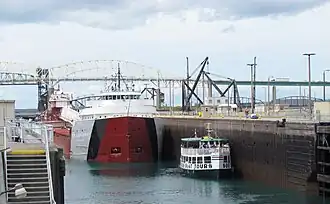 The tour boat Hiawatha and the laker Cason J. Callaway share the Poe Lock