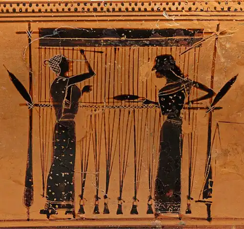 Shuttles are passed, not thrown, through warp-weighted looms. These Ancient Greek weavers have a yarn-wrapped stick.[7]