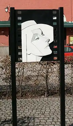 Drawing of Garbo in a city street