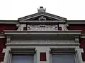 Ornamentation above the doorway of the Grim Building.