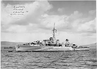 Photograph of HMS Pheasant moored at a buoy in May 1943