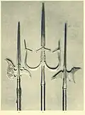 Man catcher spear with a blade and twin catching arms
