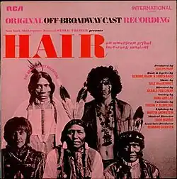 James Rado and Gerome Ragni in "hippie" costumes and long hair, together with three men in traditional Native American dress