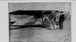 A photograph of Derwent Hall Caine with his Leopard Moth aeroplane at Close Lake Airfield