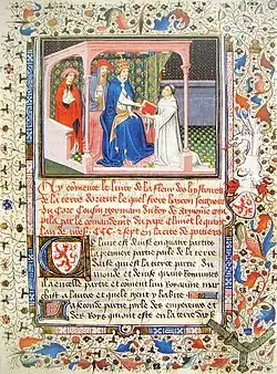 Illuminated manuscript with many colorful designs all around the margins. On the lower half of the page is calligraphic text. On the upper half is an image of a kneeling monk in a white robe giving a book to a seated pope who is wearing a lavish dark blue robe. Two assistants stand behind him.