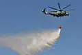 A CH-46E Sea Knight helicopter assigned to Marine Medium Helicopter Squadron 364 drops water during an annual firefighting exercise. The exercise involved Navy, Marine Corps, San Diego County Sheriff's Department and the California Department of Forestry and Fire Protection.