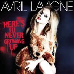 Lavigne holding a teddy bear
