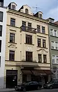 Built in 1895 by Jakob Baudrexel, a neo-baroque rental house with a bay window and rich stucco decoration in Herzogstraße 12