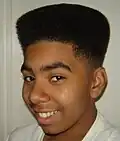 Image 53African-American teenager with Hitop fade, popular in the early 1990s. (from 1990s in fashion)