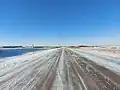 Highway 40 in North Dakota with wind turbines in the background