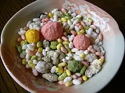 Arare is a type of bite-sized Japanese cracker made from glutinous rice and flavored with soy sauce. Sweet and savory varieties are prepared.