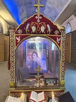 Weeping icon of Virgin Mary, Prayer book and Holy cross