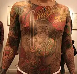 A man with an irezumi tattoo of Acala