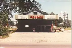 Homer's Texaco Service Station at the intersection of Main Street & Lake Dautrieve Road, circa 1981