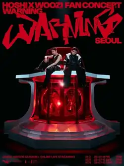 Hoshi and Woozi sitting on a red alarm structure with red text demonstrating the tour name