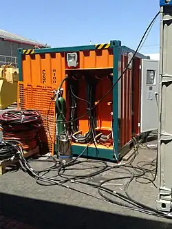 A small steel container housing the controls for the launch system for a hyperbaric escape capsule.