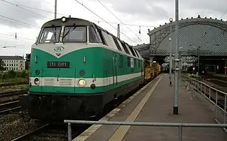 ITL 118&nbsp;001 with permanent way train in Dresden-Neustadt station