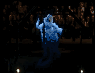 A projected image of a woman dancing slowly, wearing a white dress