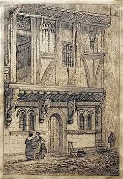 Etching of a half-timbered house in middle Water Lane York in 1827 (now Cumberland Street). Two women and a child stand in the street in the left foreground.[14][19]