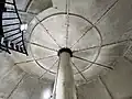Interior view of Gibbs Hill Lighthouse looking up at a ceiling