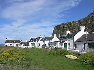 Cottages at Ellenabeich under the cliffs of Dùn Mòr